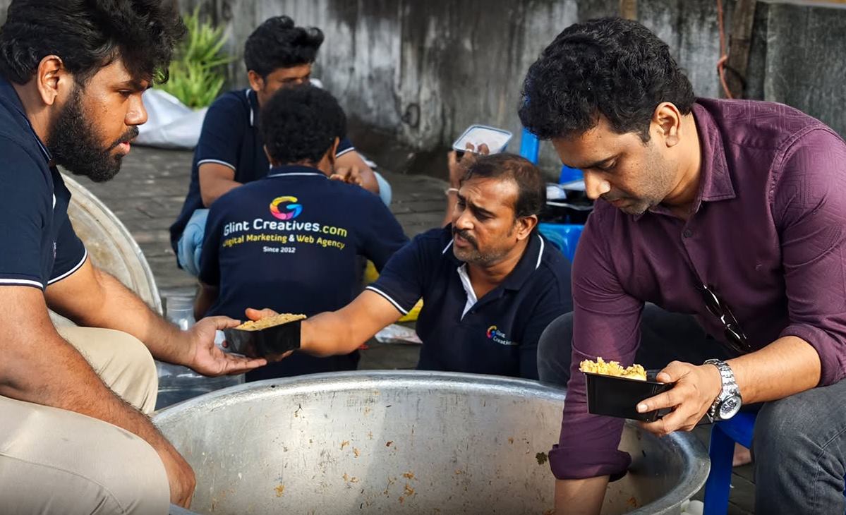 Team serving Christmas biryani to people in need 2025