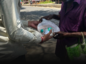 Glint Creatives GSR CSR Initiative July 2025 - Food and Slippers Distribution